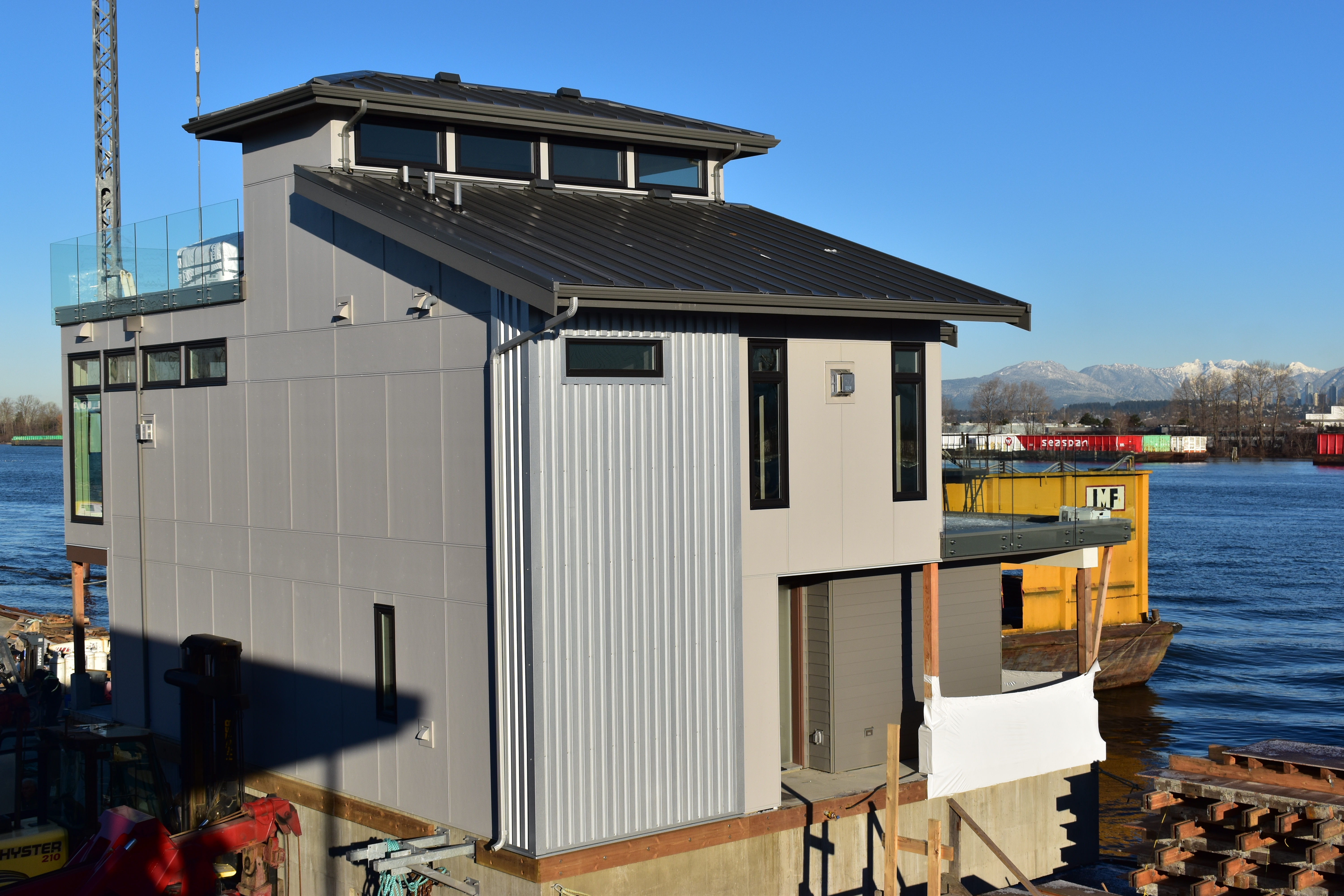 Launching of another float home for Pinnacle Homes. West Coast Windows